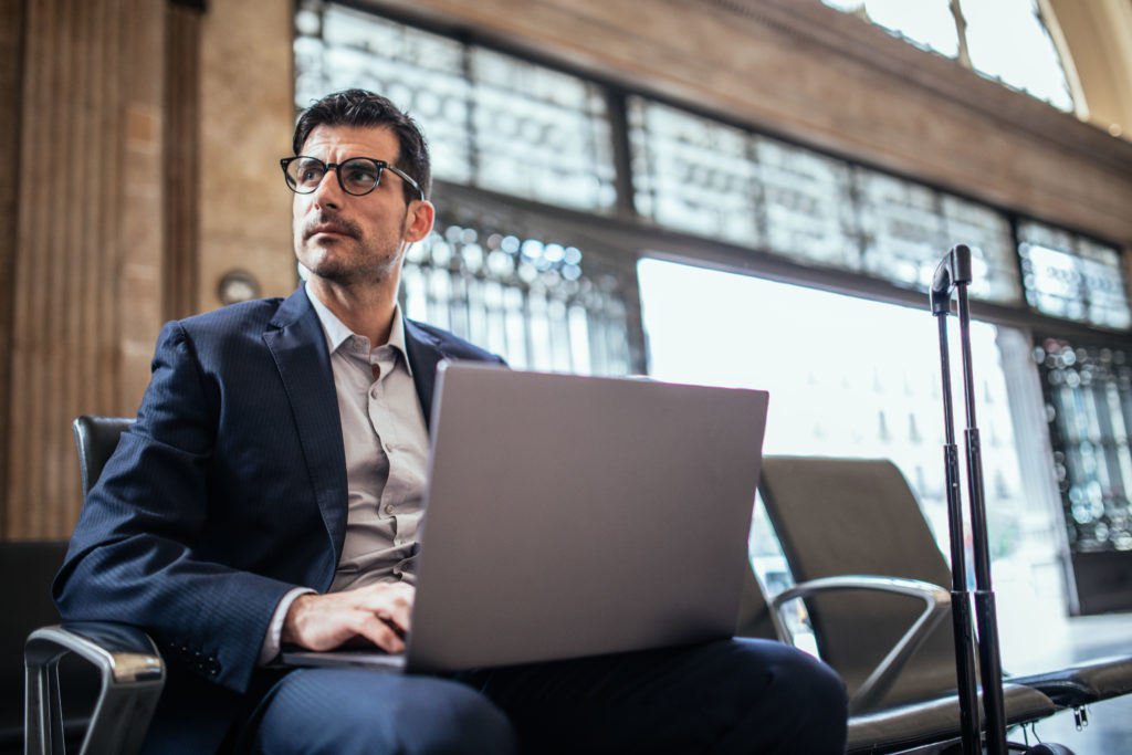 Man traveling using laptop