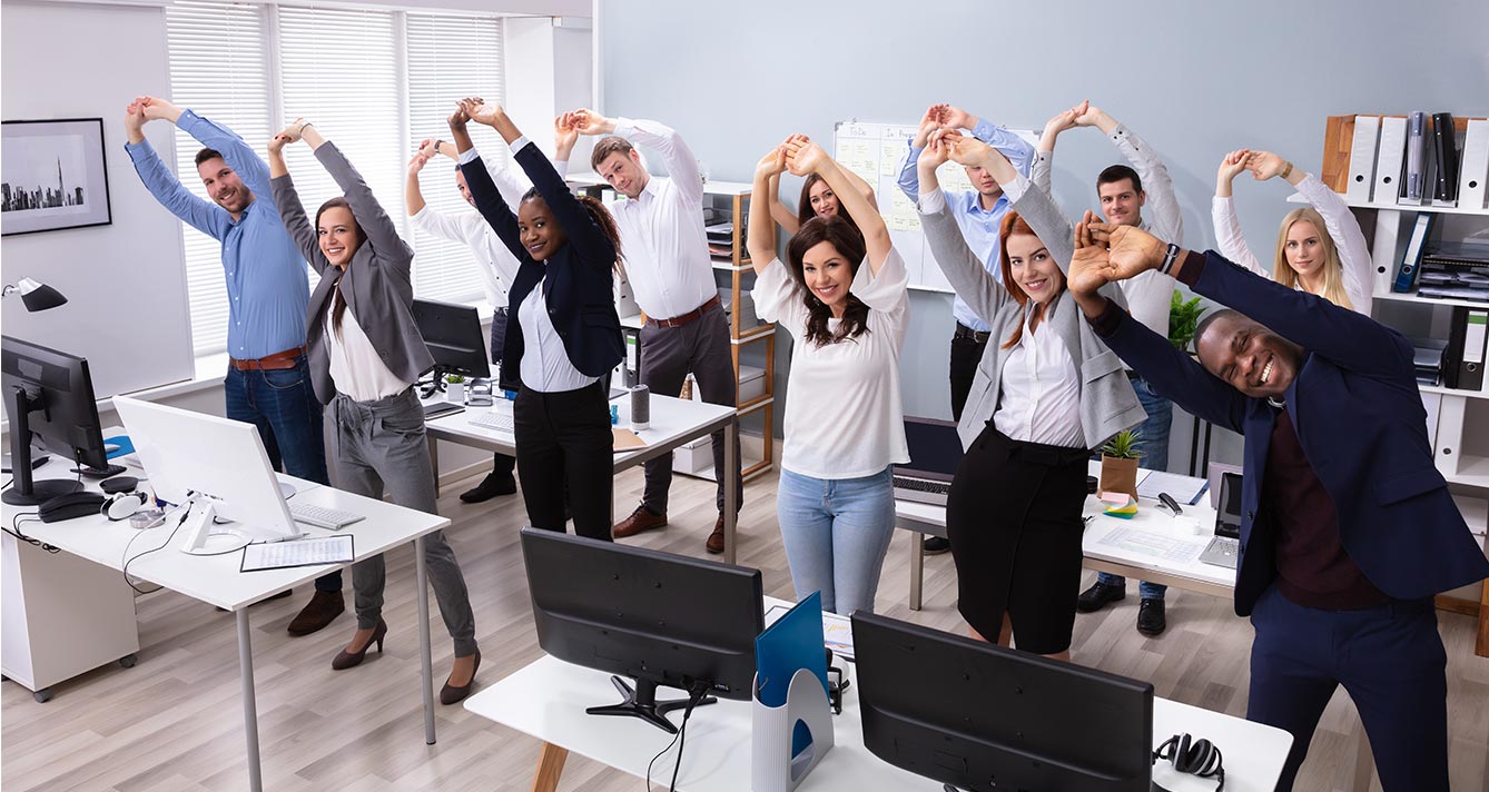 Office employees stretching