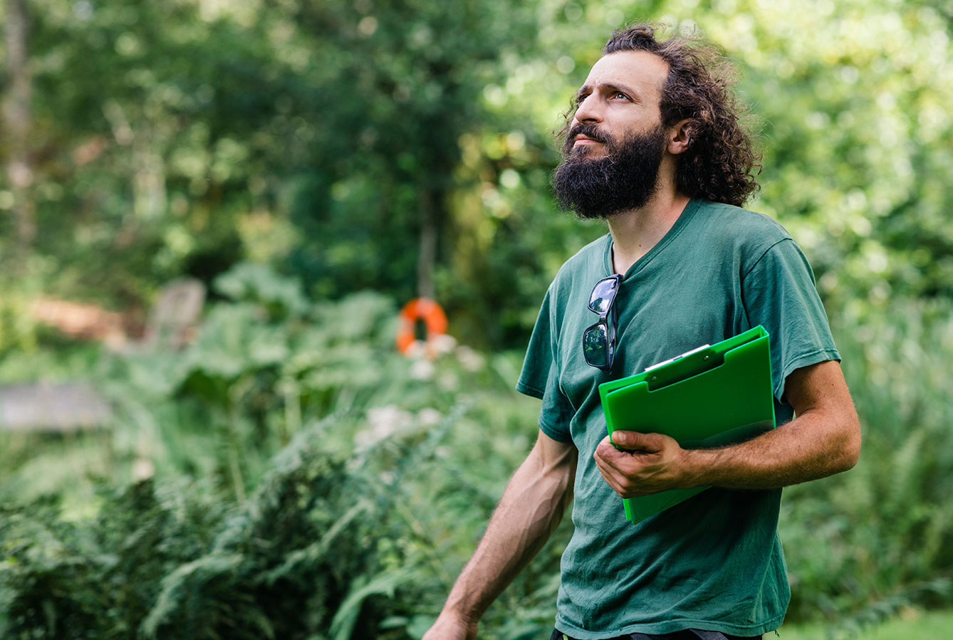 Man surveying garden