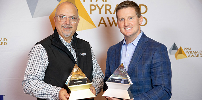 Gary Biron and Chris McKee accepting PPAI Pyramid Awards