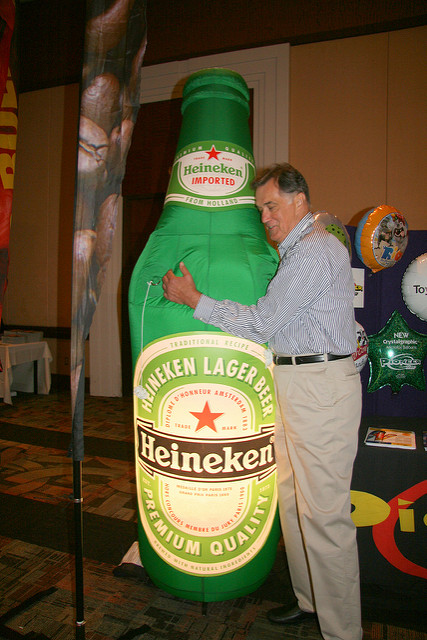 Tradeshow attendee posing with unique display